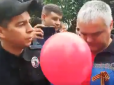 На Запоріжжі люди з георгіївськими стрічками спровокували драку під час святкових заходів (відео)